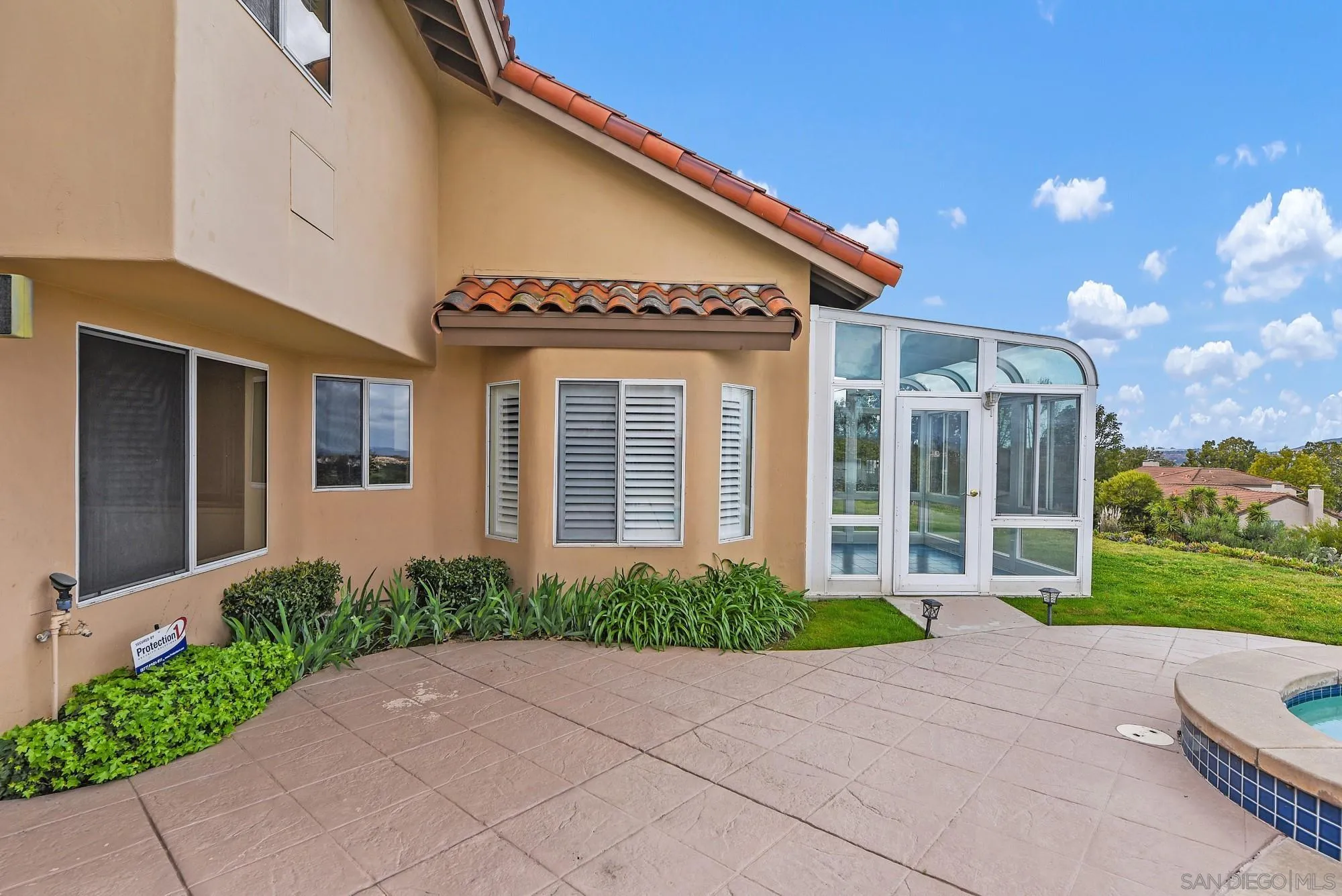 13000 Lomas Verdes Drive Poway, CA 92064 - Photo 52 of 58 a front view of a house with garden