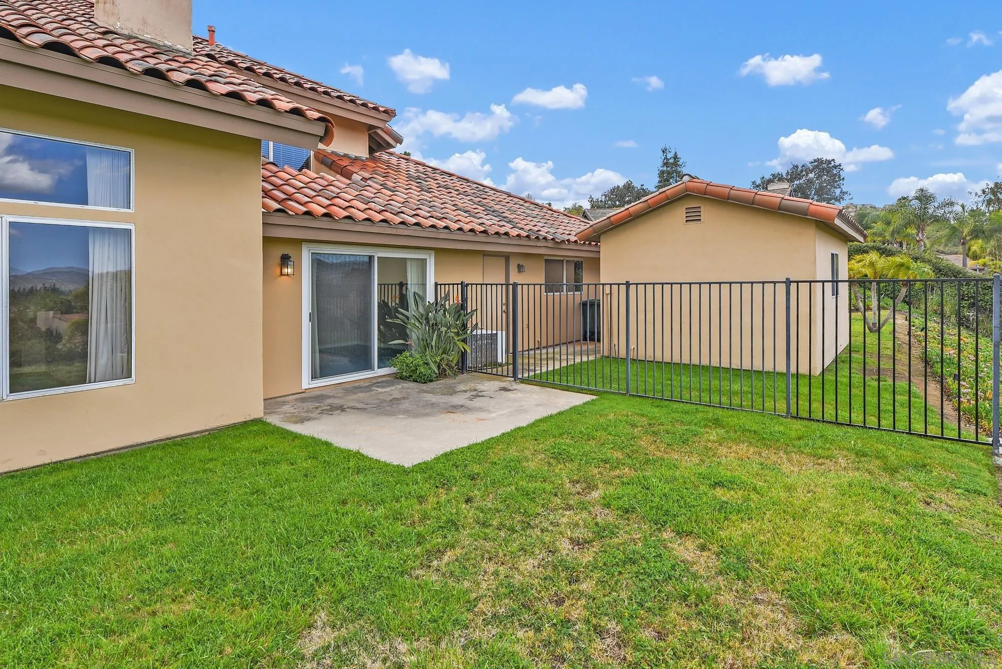 13000 Lomas Verdes Drive Poway, CA 92064 - Photo 55 of 58 a view of a house with a yard and porch