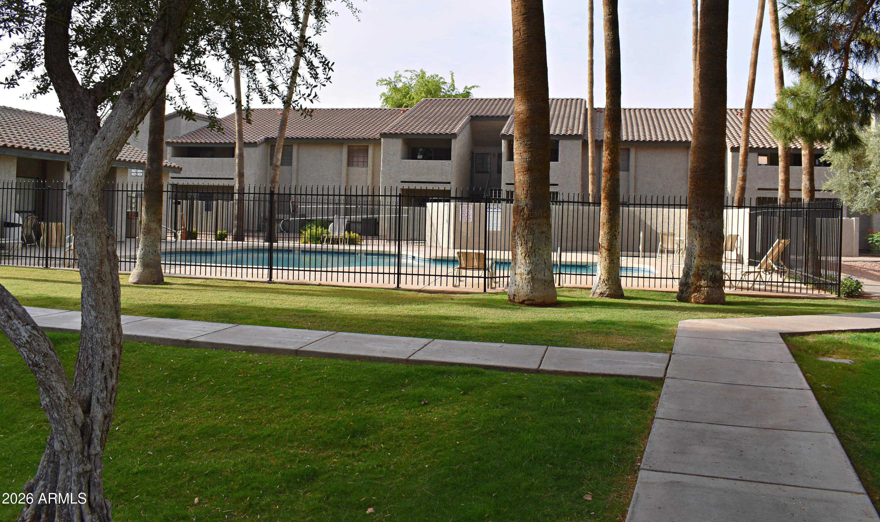 533 West Guadalupe Road, Unit 1053 Mesa, AZ 85210 - Photo 3 of 18 Green Belt & Main Pool