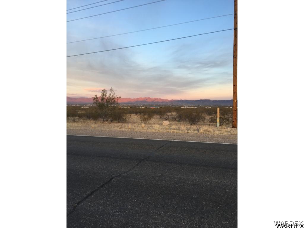 On South Estrella Road Golden Valley, AZ 86413 - Photo 6 of 16 ON PAVED ROAD