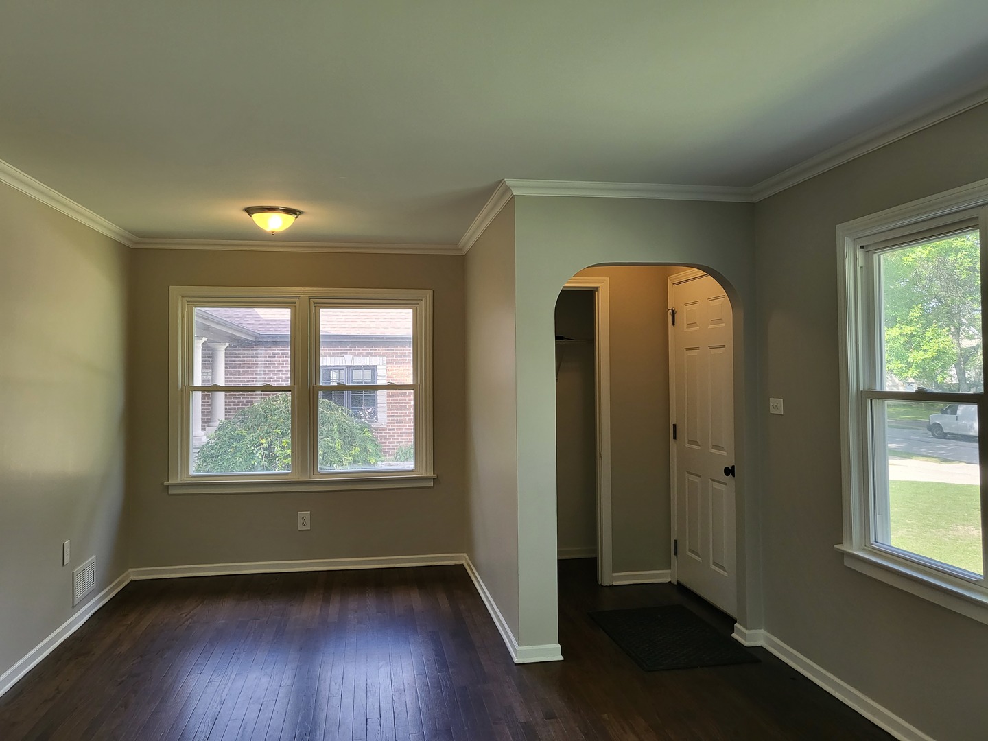 644 Rochelle Terrace Lombard, IL 60148 - Photo 3 of 31 an empty room with wooden floor and windows