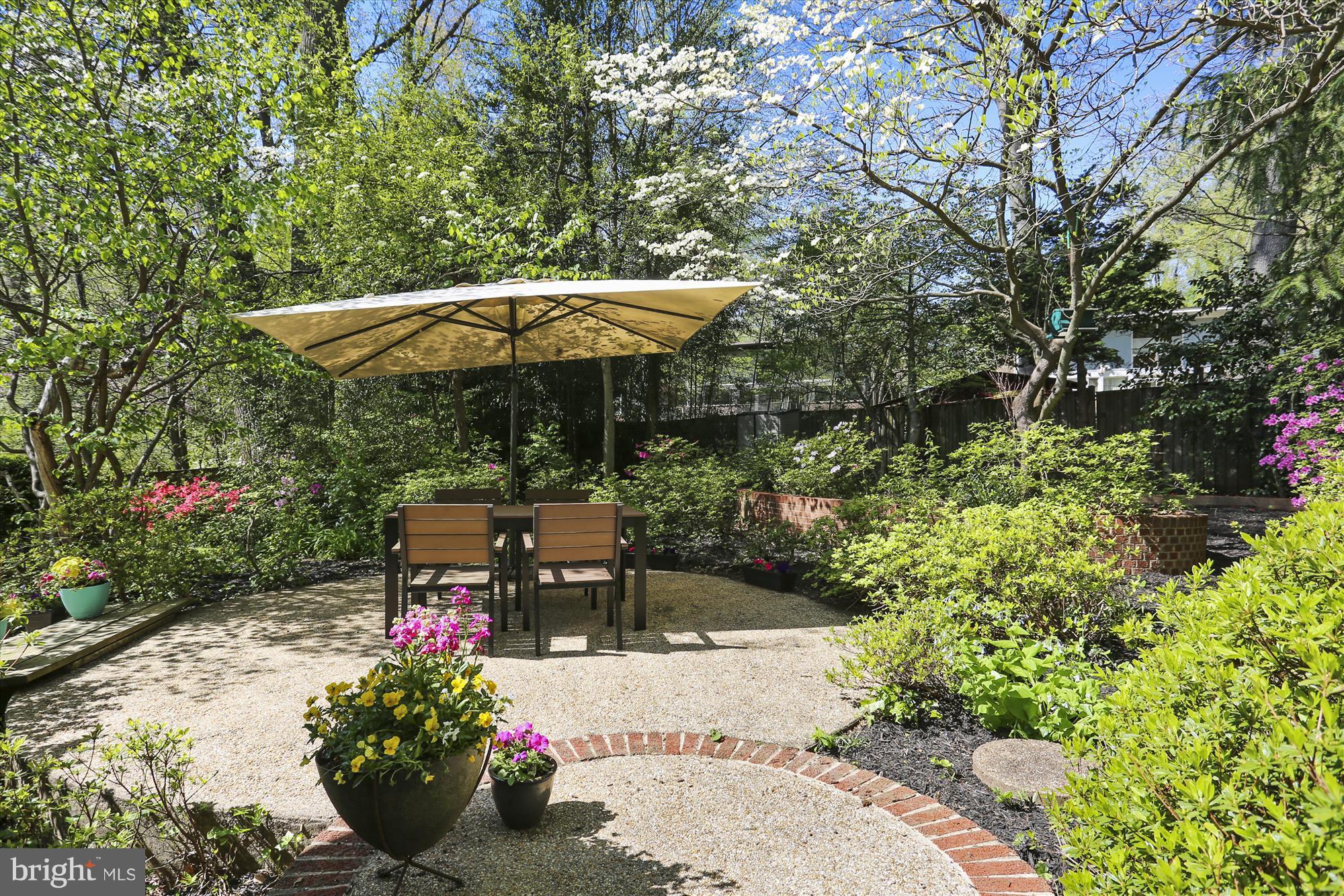 3909 Rickover Road Silver Spring, MD 20902 - Photo 14 of 30 Pooling patios meet lush landscape.