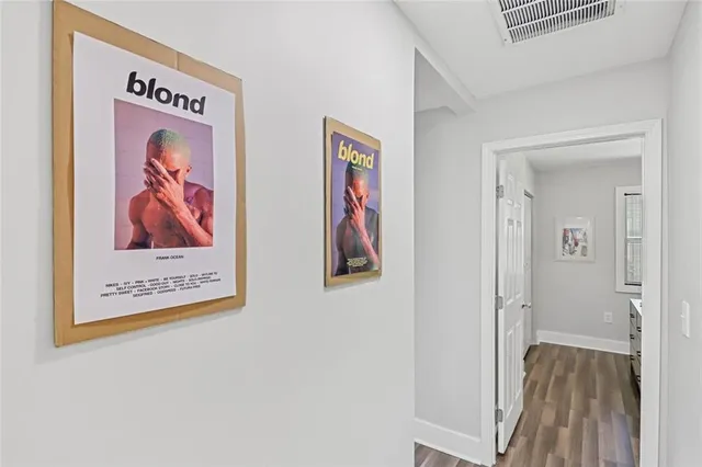 an entryway with wooden floor