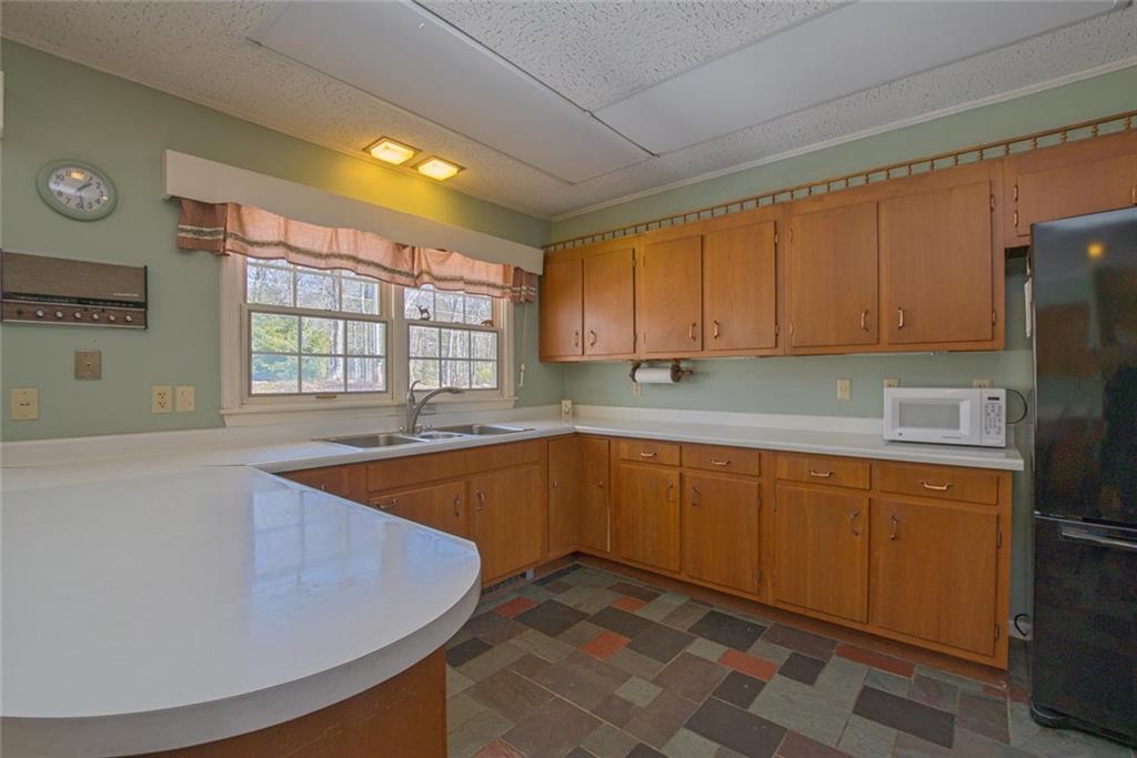 978 Buckfield Road South Paris, ME 04281 - Photo 2 of 31 Kitchen Cabinets, tile flooring
