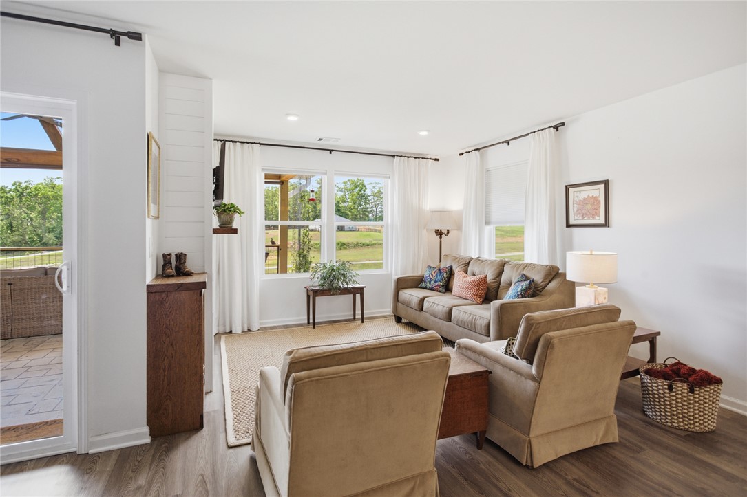 412 Chadwick Lane Walhalla, SC 29691 - Photo 5 of 37 This naturally illuminated living room features durable flooring and convenient outdoor access.