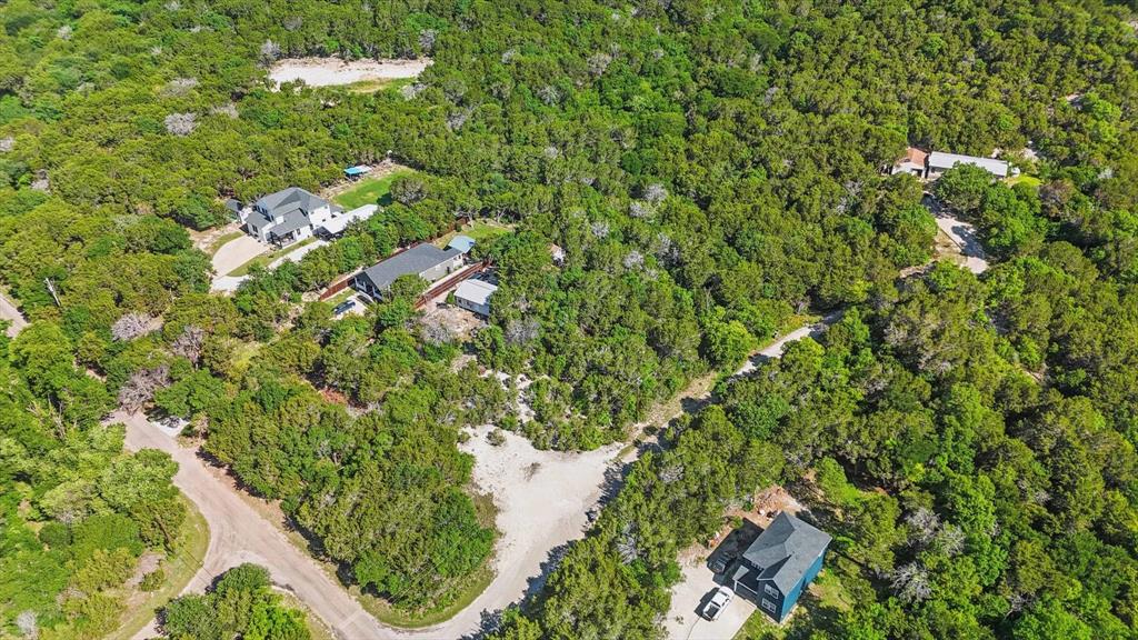 4900 Shining Star Trail Rio Vista, TX 76093 - Photo 5 of 11 an aerial view of a house with a yard