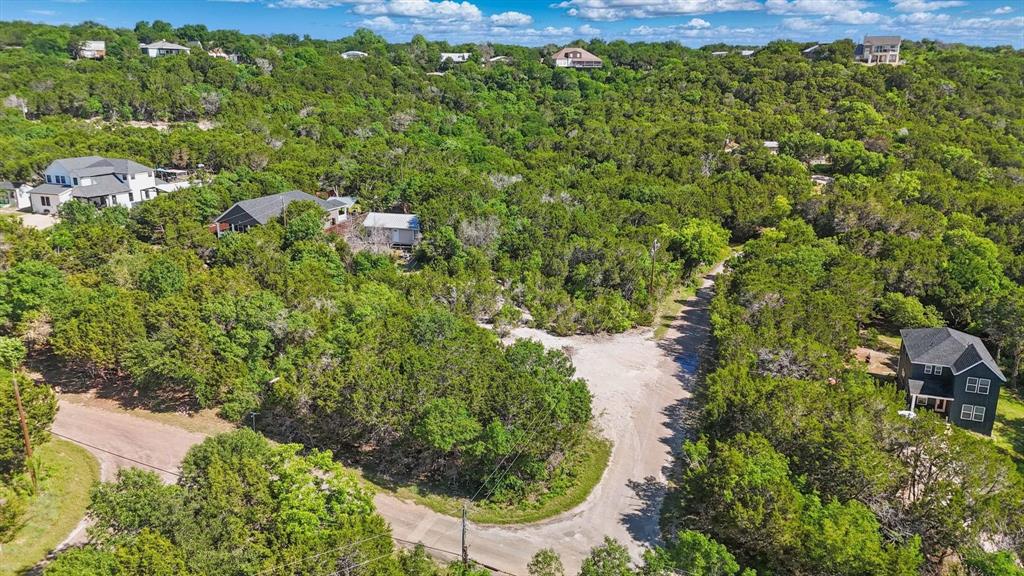4900 Shining Star Trail Rio Vista, TX 76093 - Photo 10 of 11 an aerial view of residential house with outdoor space and trees all around