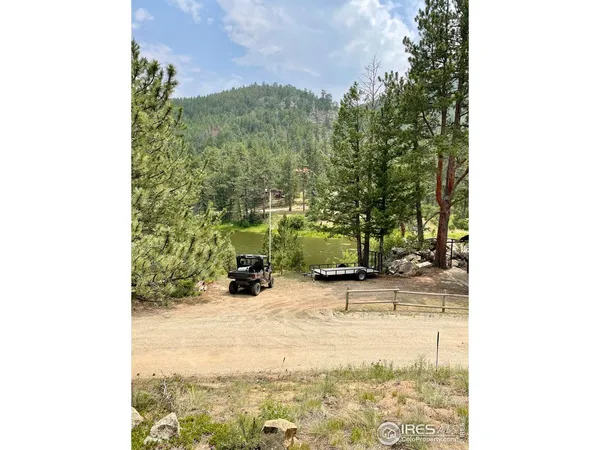 a view of a backyard of the house