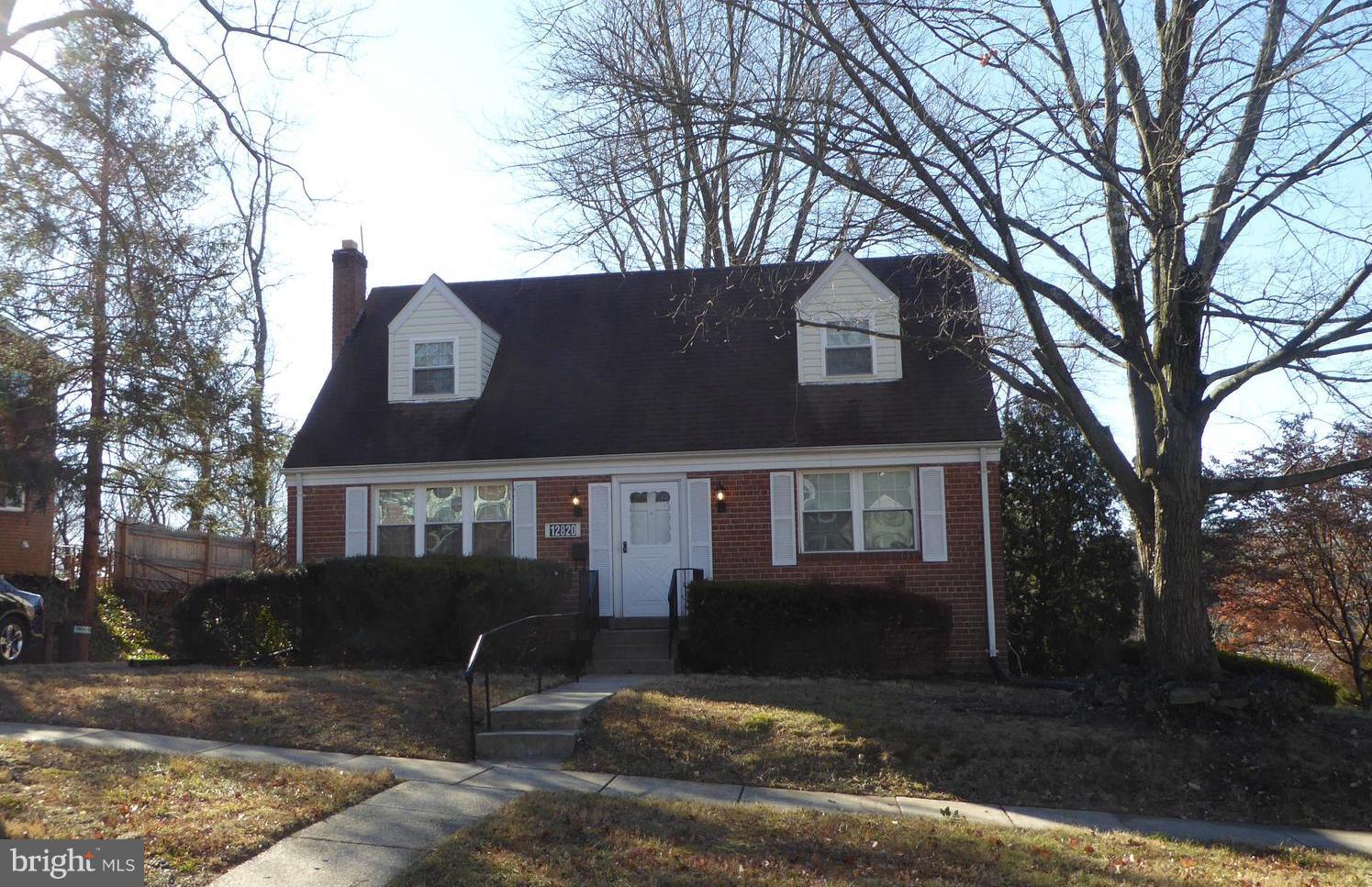 12820 Crisfield Road Silver Spring, MD 20906 - Photo 2 of 24 a view of house with a yard