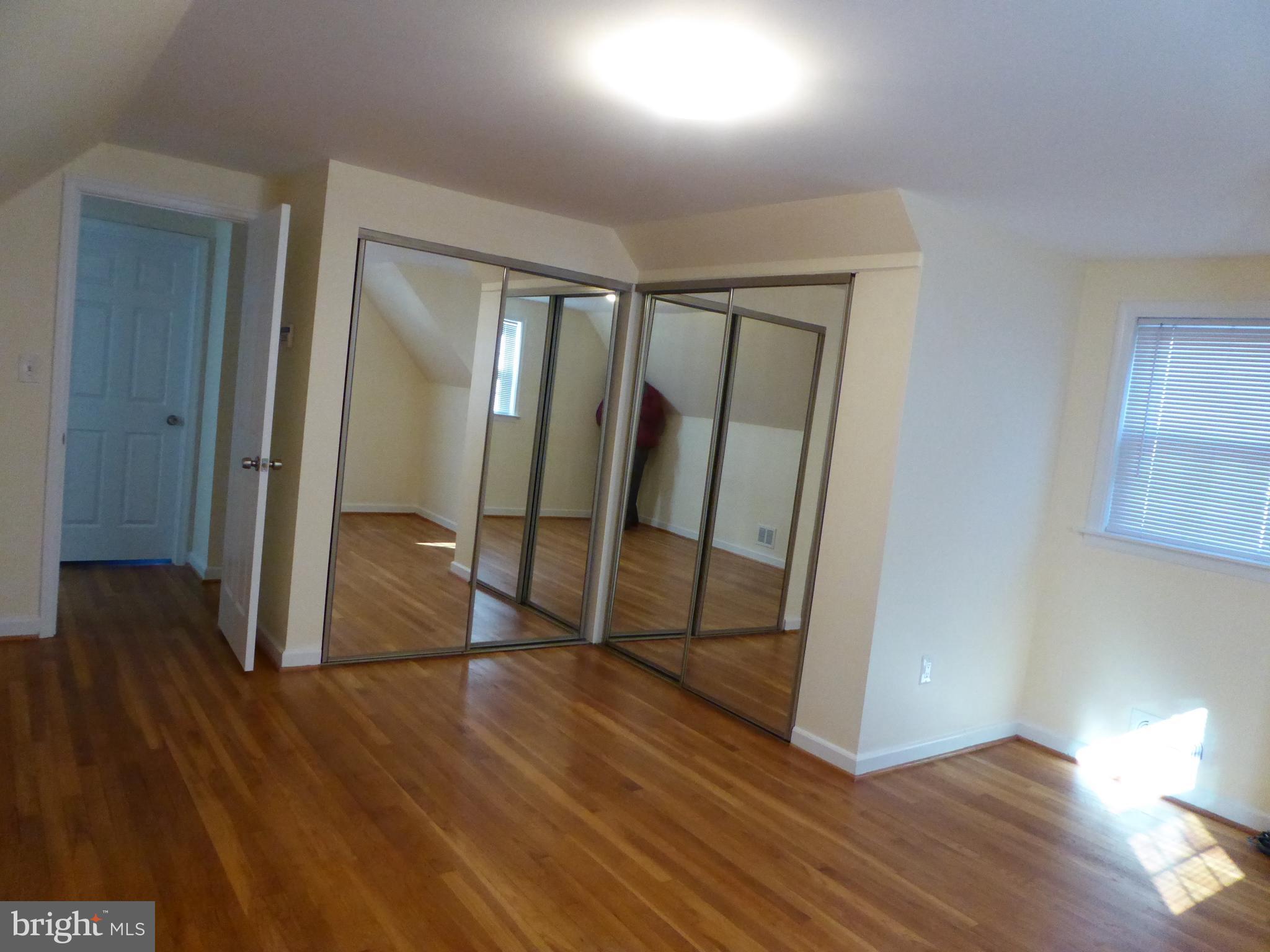 12820 Crisfield Road Silver Spring, MD 20906 - Photo 19 of 24 a view of entryway with wooden floor
