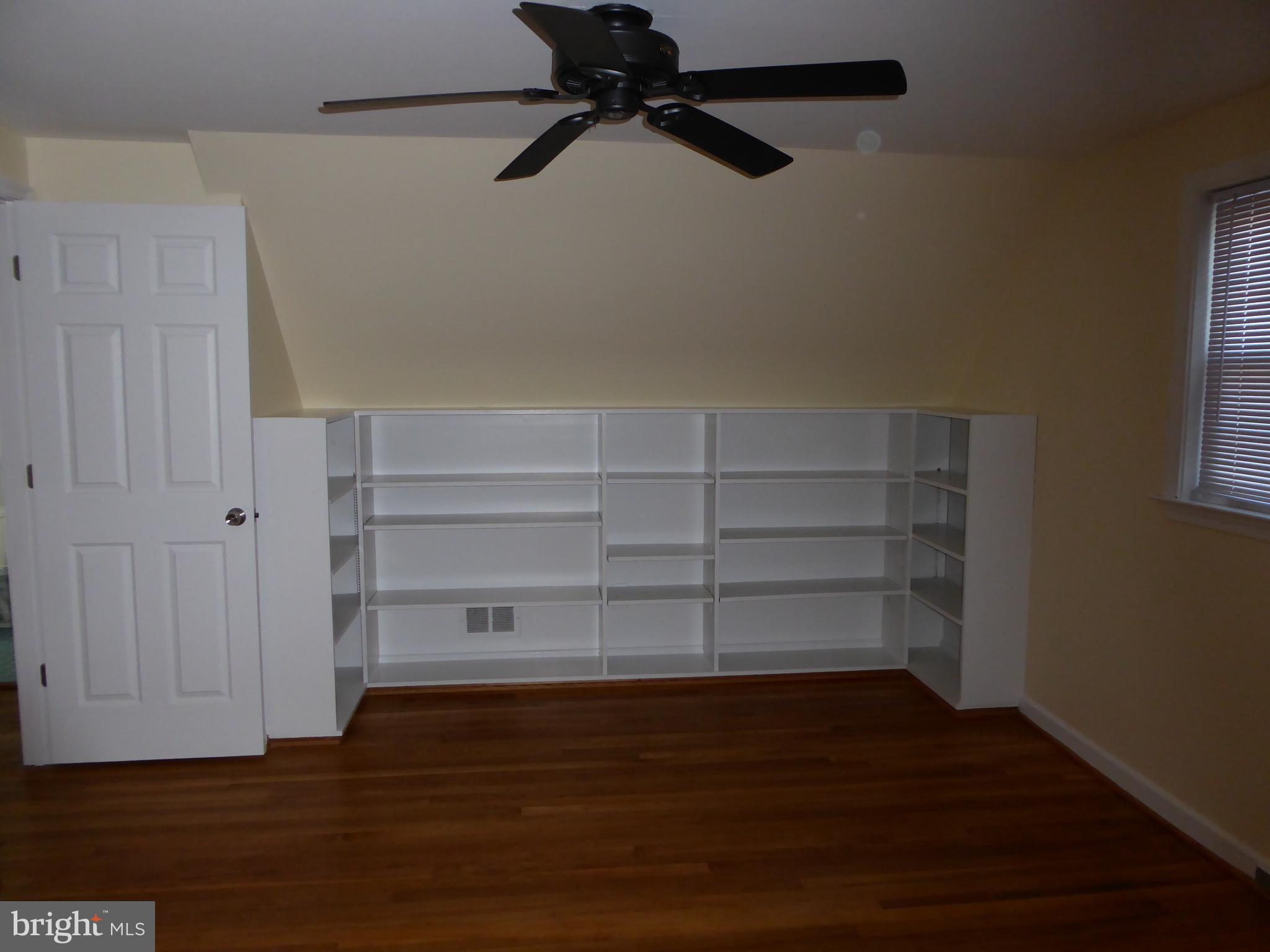 12820 Crisfield Road Silver Spring, MD 20906 - Photo 20 of 24 a view of walk in closet with empty racks