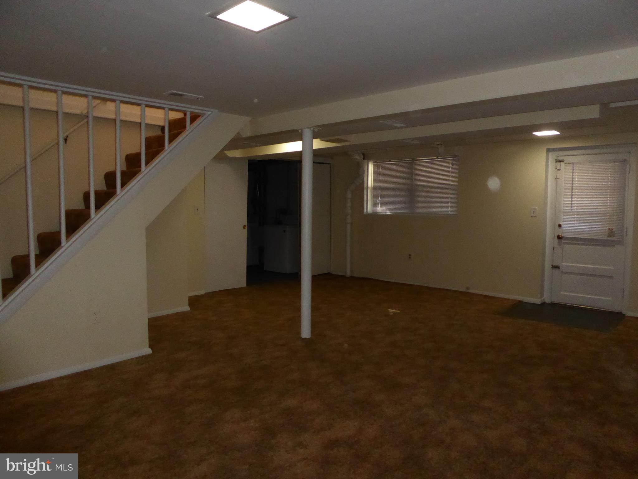 12820 Crisfield Road Silver Spring, MD 20906 - Photo 21 of 24 a view of a hallway with an empty space