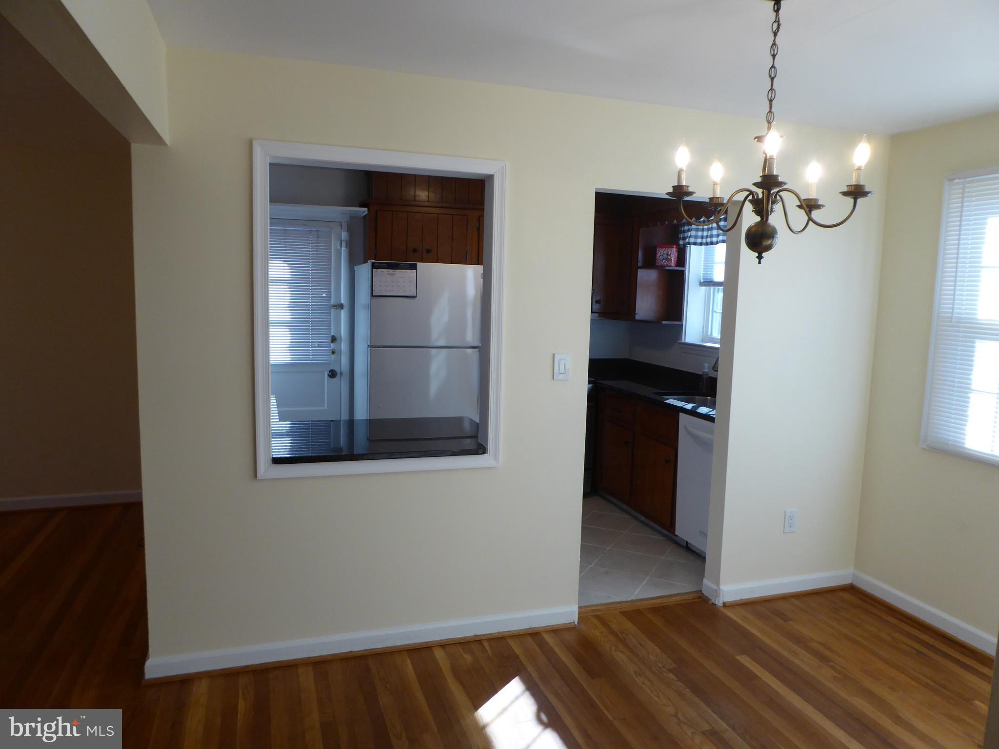 12820 Crisfield Road Silver Spring, MD 20906 - Photo 10 of 24 a view of a kitchen from the hallway