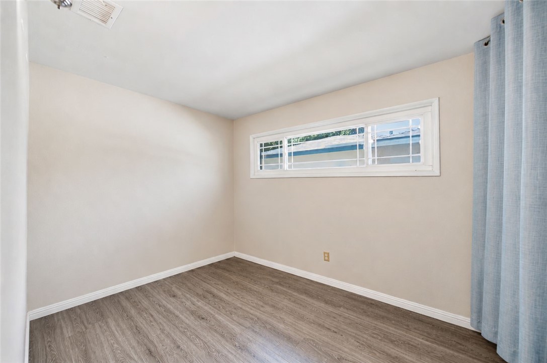 4869 Serrano Place Riverside, CA 92504 - Photo 29 of 40 Versatile room with natural light, neutral finishes, and flexible potential for a bedroom, office, or hobby space.