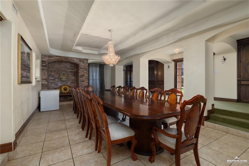 4523 South Tower Road Edinburg, TX 78542 - Photo 18 of 32 a dining room with furniture and window