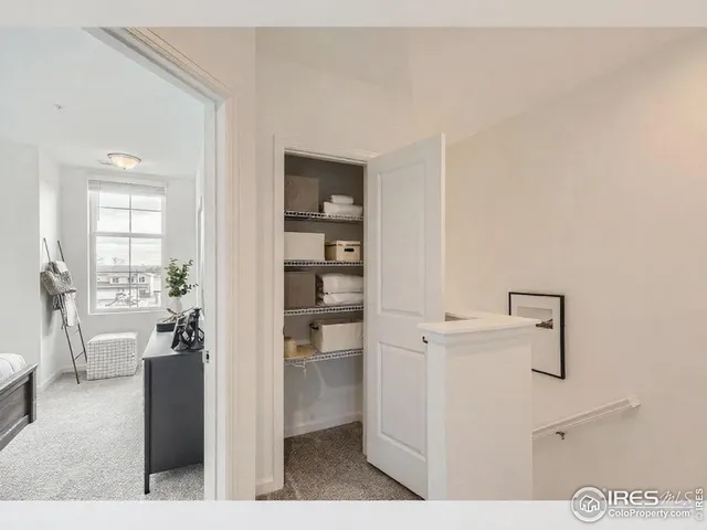 a view of a room with rack and wooden floor