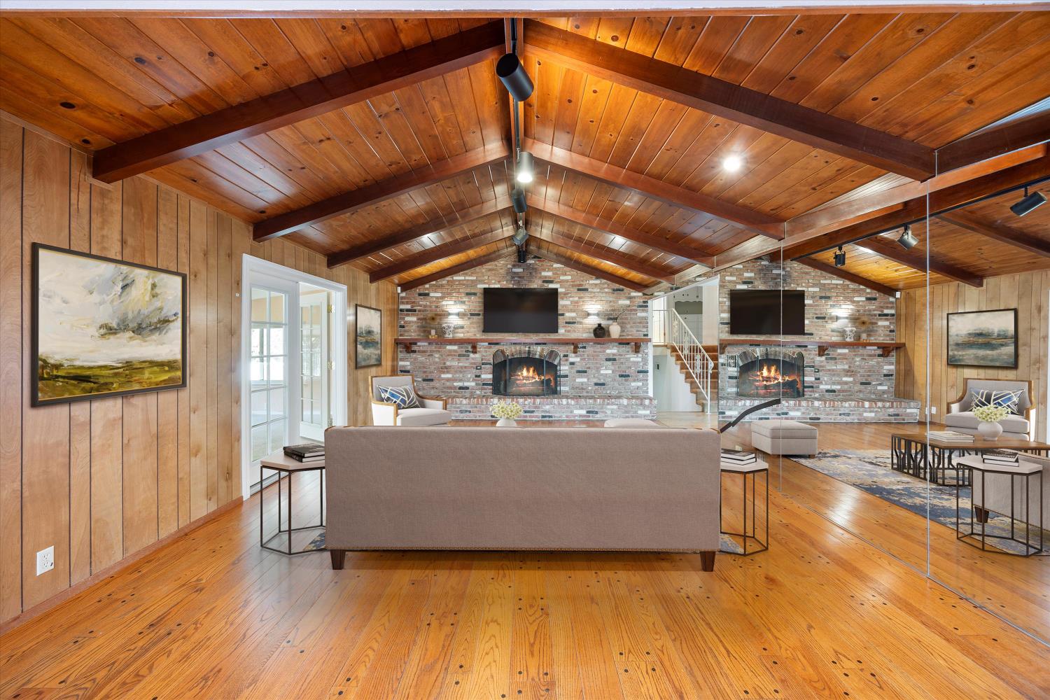 1786 Le Bec Court Lodi, CA 95240 - Photo 12 of 65 a view of a livingroom with furniture wooden floor and a fireplace