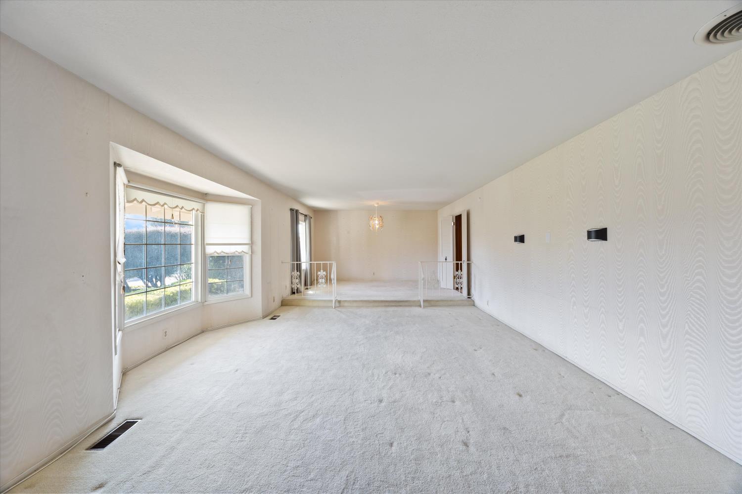 1786 Le Bec Court Lodi, CA 95240 - Photo 14 of 65 a view of an empty room with a window