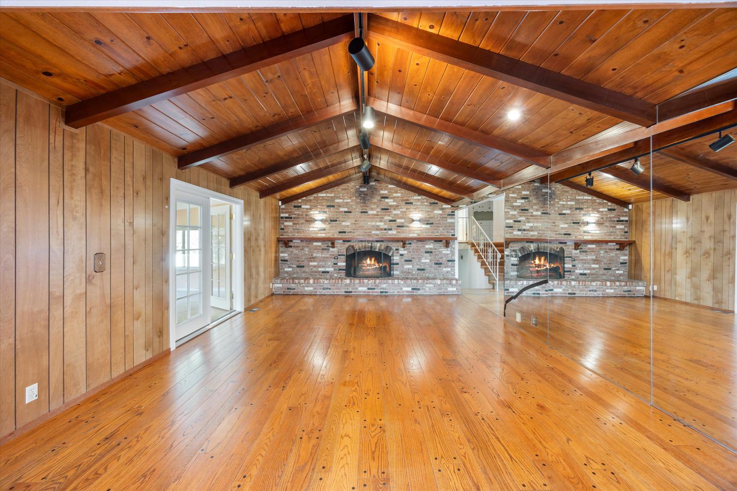 1786 Le Bec Court Lodi, CA 95240 - Photo 20 of 65 a view of empty room with wooden floor
