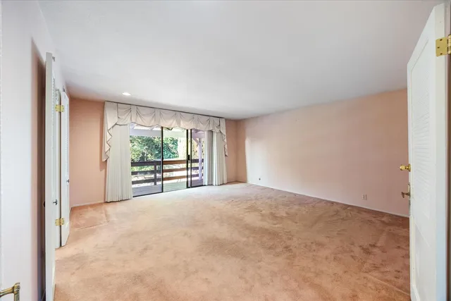 a spacious bathroom with a bathtub shower sink and toilet