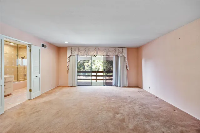 a bathroom with a sink double vanity and shower