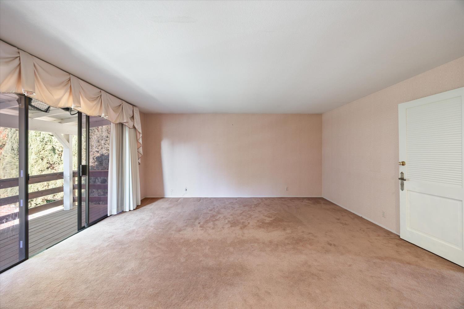 1786 Le Bec Court Lodi, CA 95240 - Photo 28 of 65 a view of an empty room with a window