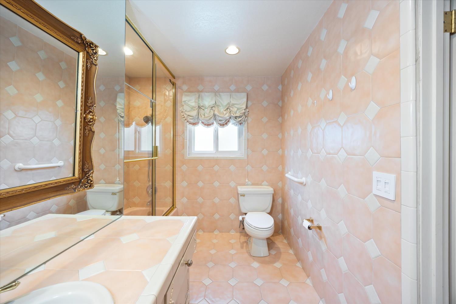 1786 Le Bec Court Lodi, CA 95240 - Photo 32 of 65 a spacious bathroom with a bathtub shower sink and toilet