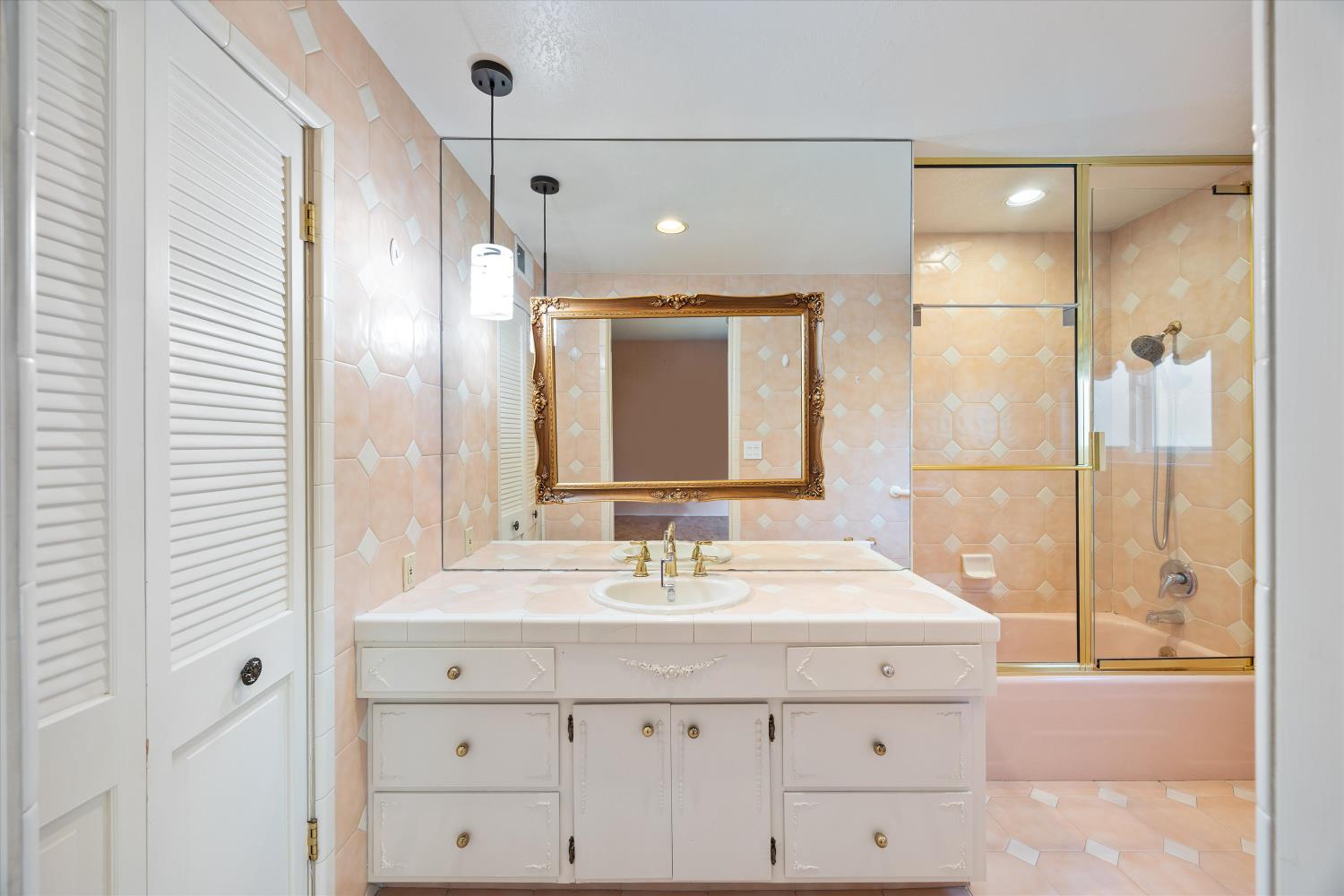 1786 Le Bec Court Lodi, CA 95240 - Photo 33 of 65 a bathroom with a sink double vanity and shower