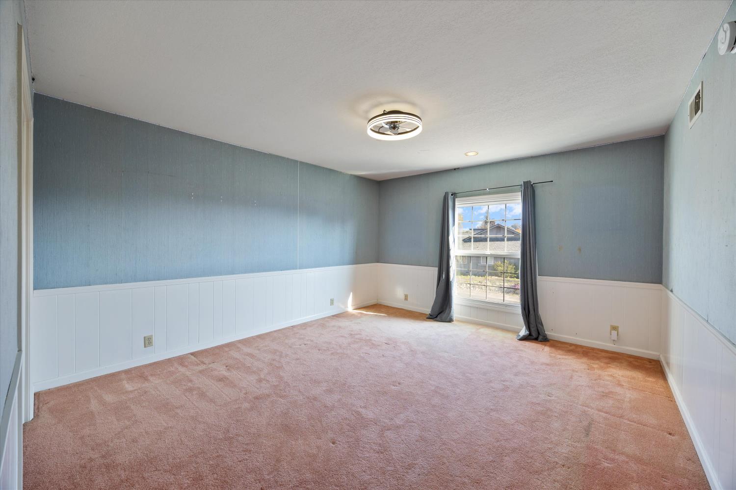 1786 Le Bec Court Lodi, CA 95240 - Photo 37 of 65 a view of an empty room with a window