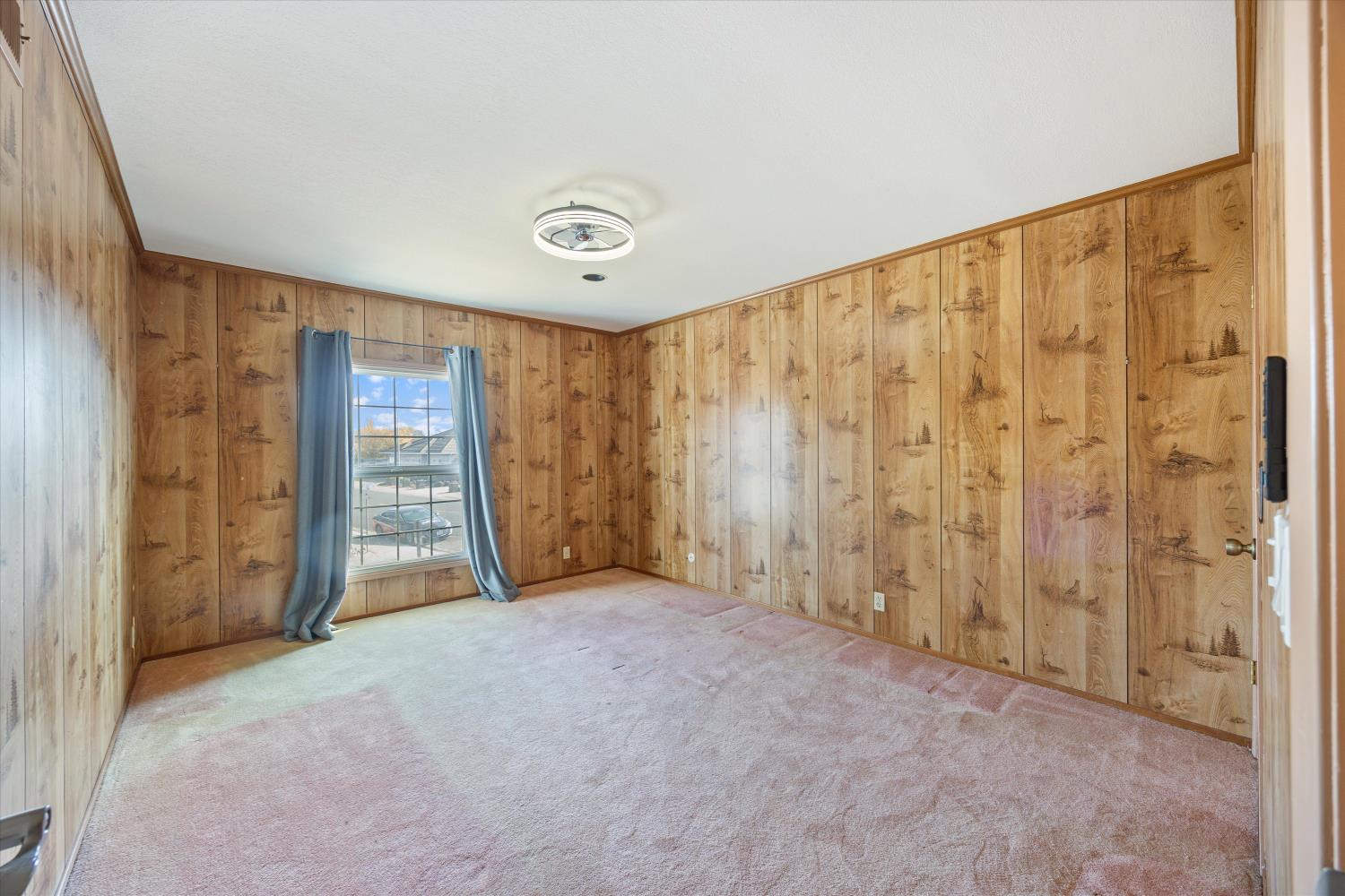 1786 Le Bec Court Lodi, CA 95240 - Photo 39 of 65 a view of an empty room with a window