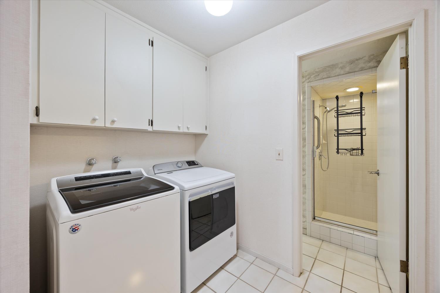 1786 Le Bec Court Lodi, CA 95240 - Photo 41 of 65 a view of a storage and utility room with washer and dryer