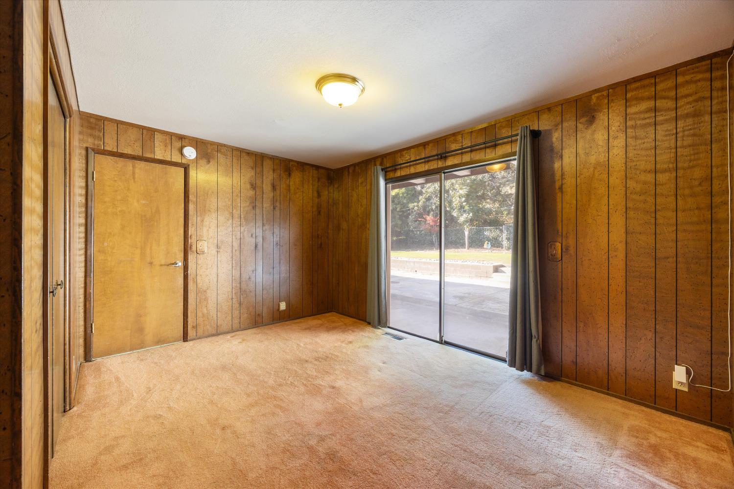 1786 Le Bec Court Lodi, CA 95240 - Photo 44 of 65 a view of an empty room with a window