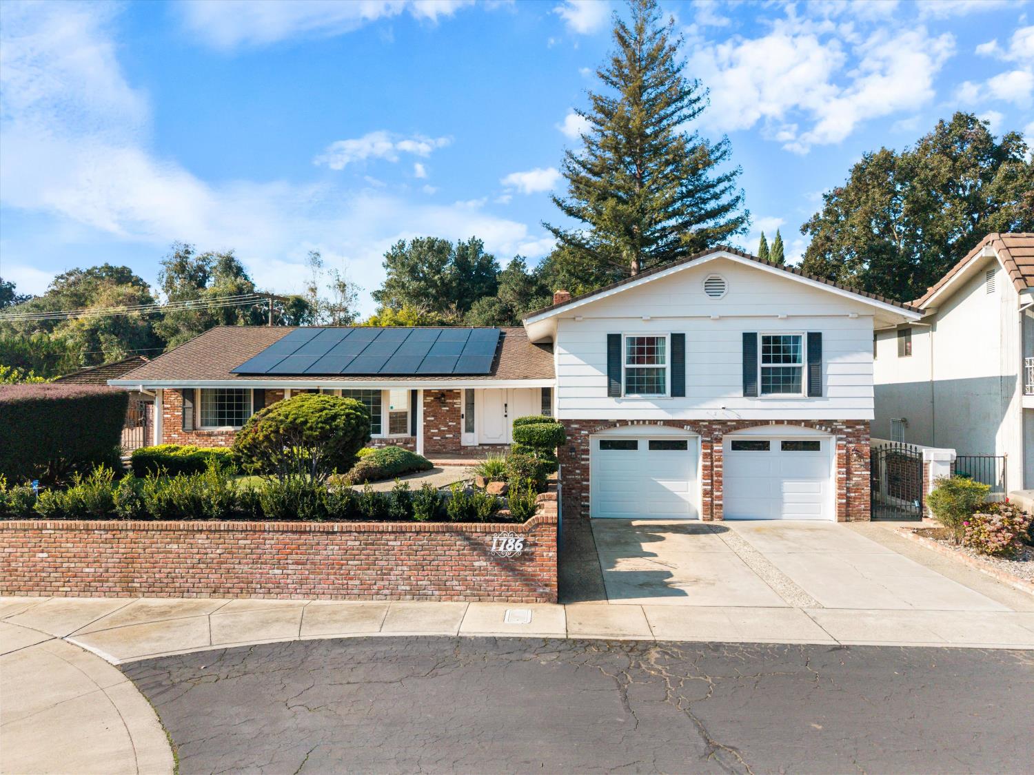 1786 Le Bec Court Lodi, CA 95240 - Photo 59 of 65 a front view of a house with a yard