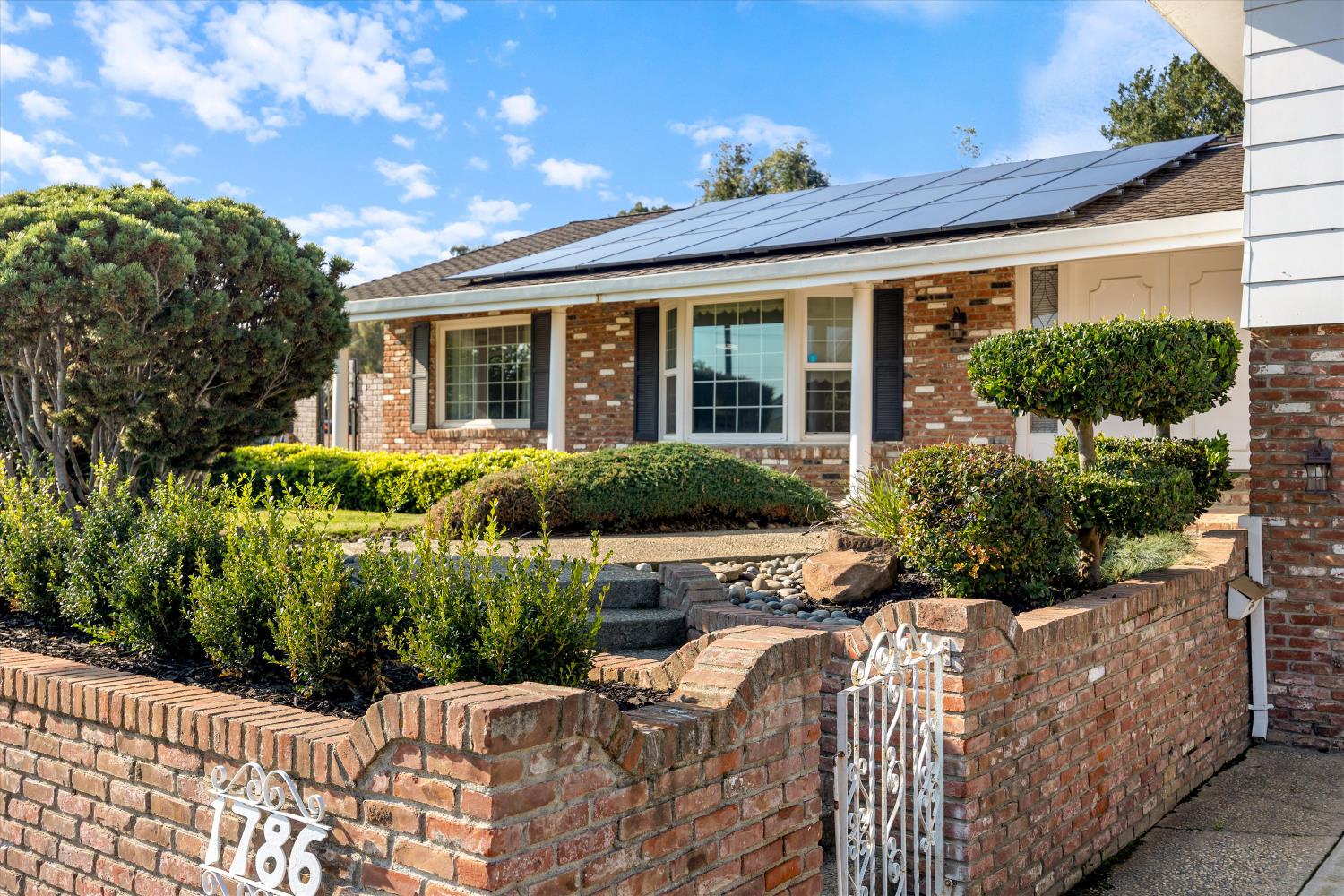 1786 Le Bec Court Lodi, CA 95240 - Photo 64 of 65 a view of a house with backyard and sitting area