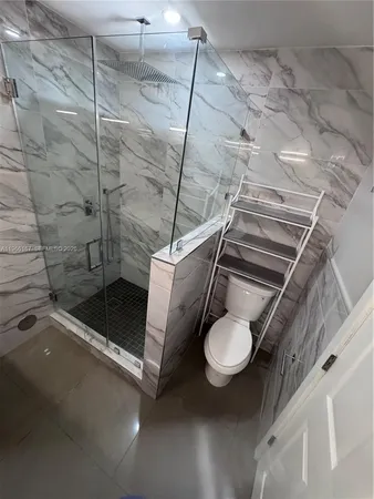 a bathroom with a sink and toilet