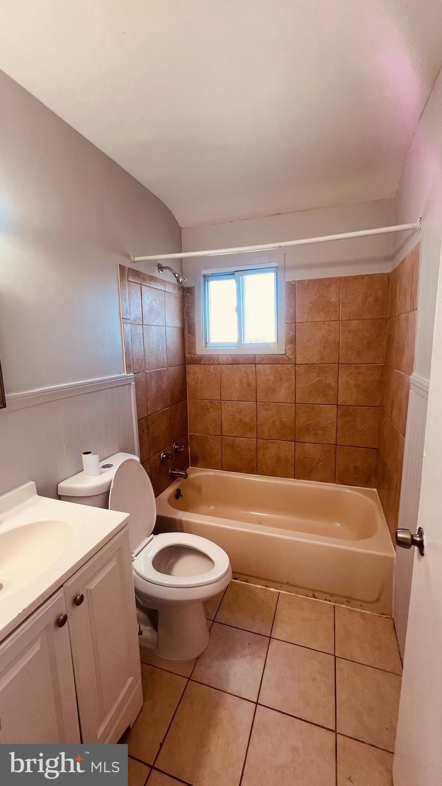 4413 Fenor Road Halethorpe, MD 21227 - Photo 15 of 31 a bathroom with a sink a toilet and bathtub