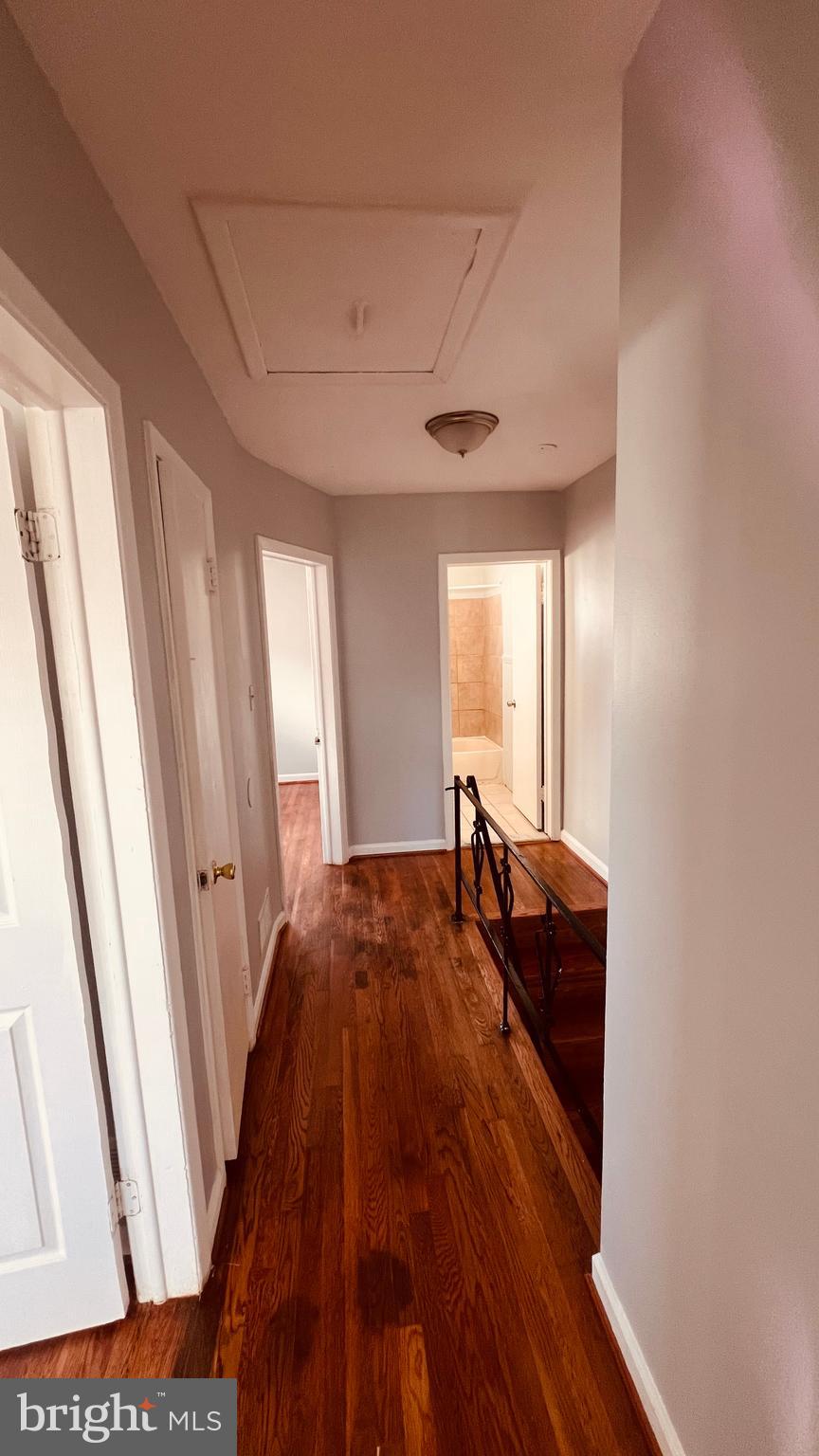 4413 Fenor Road Halethorpe, MD 21227 - Photo 24 of 31 a bed room with a bed and a window