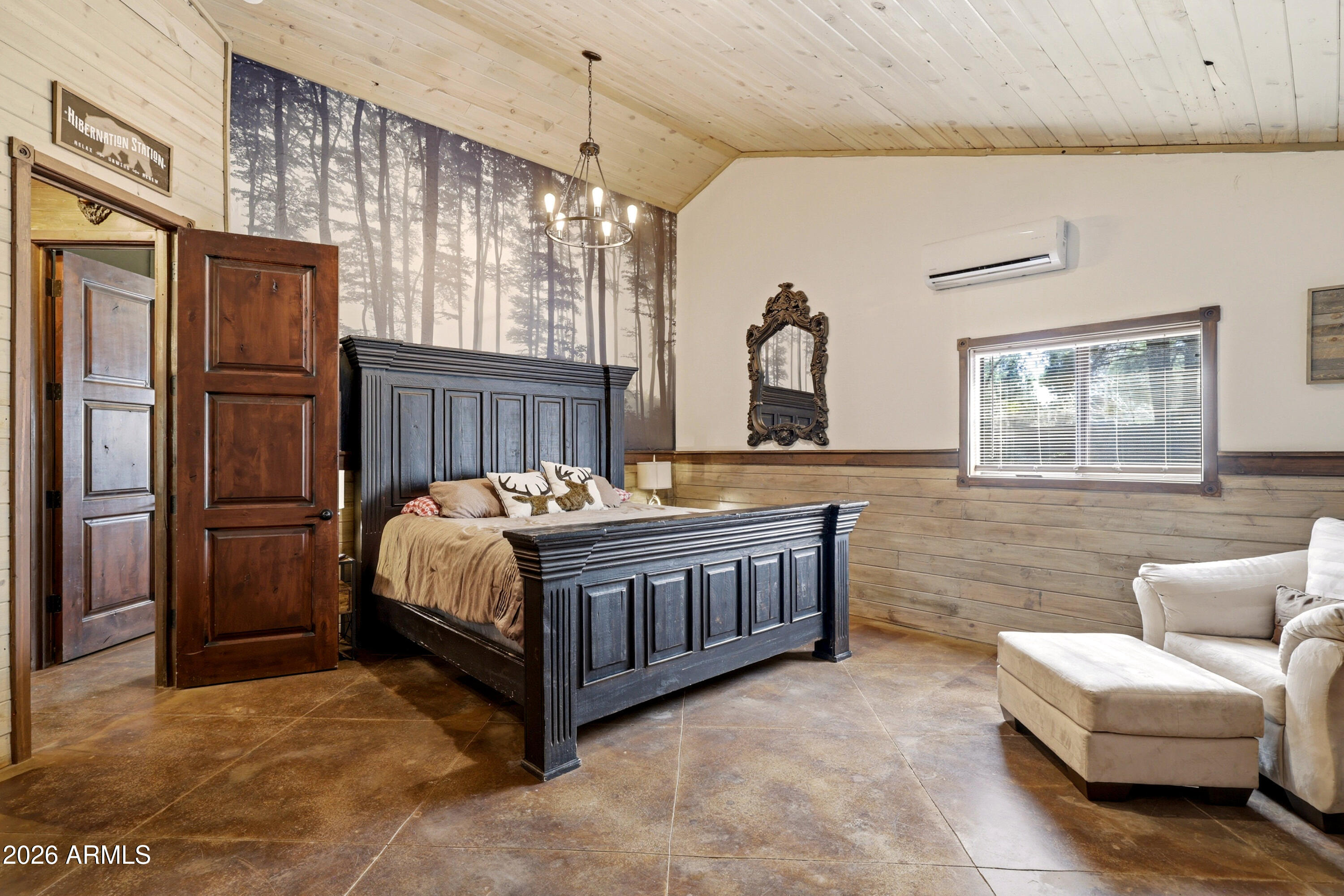 4971 Buck Springs Road Pinetop, AZ 85935 - Photo 18 of 32 a bedroom with bed and a couch