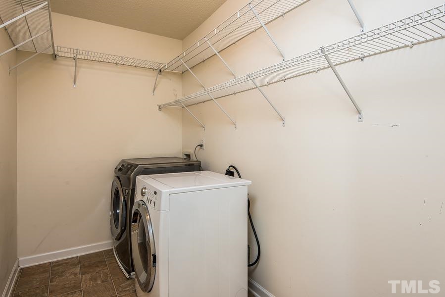 2643 Quarry Springs Road Raleigh, NC 27610 - Photo 11 of 19 a utility room with dryer and washer