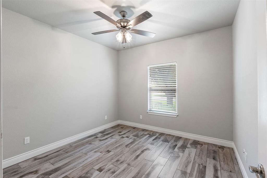10301 Ravenswood Road Granbury, TX 76049 - Photo 35 of 38 Spacious bedroom