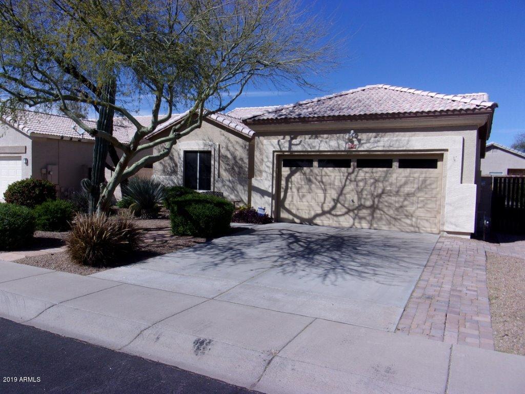 2742 East Harwell Road Gilbert, AZ 85234 - Photo 1 of 45 a front view of a house with garden