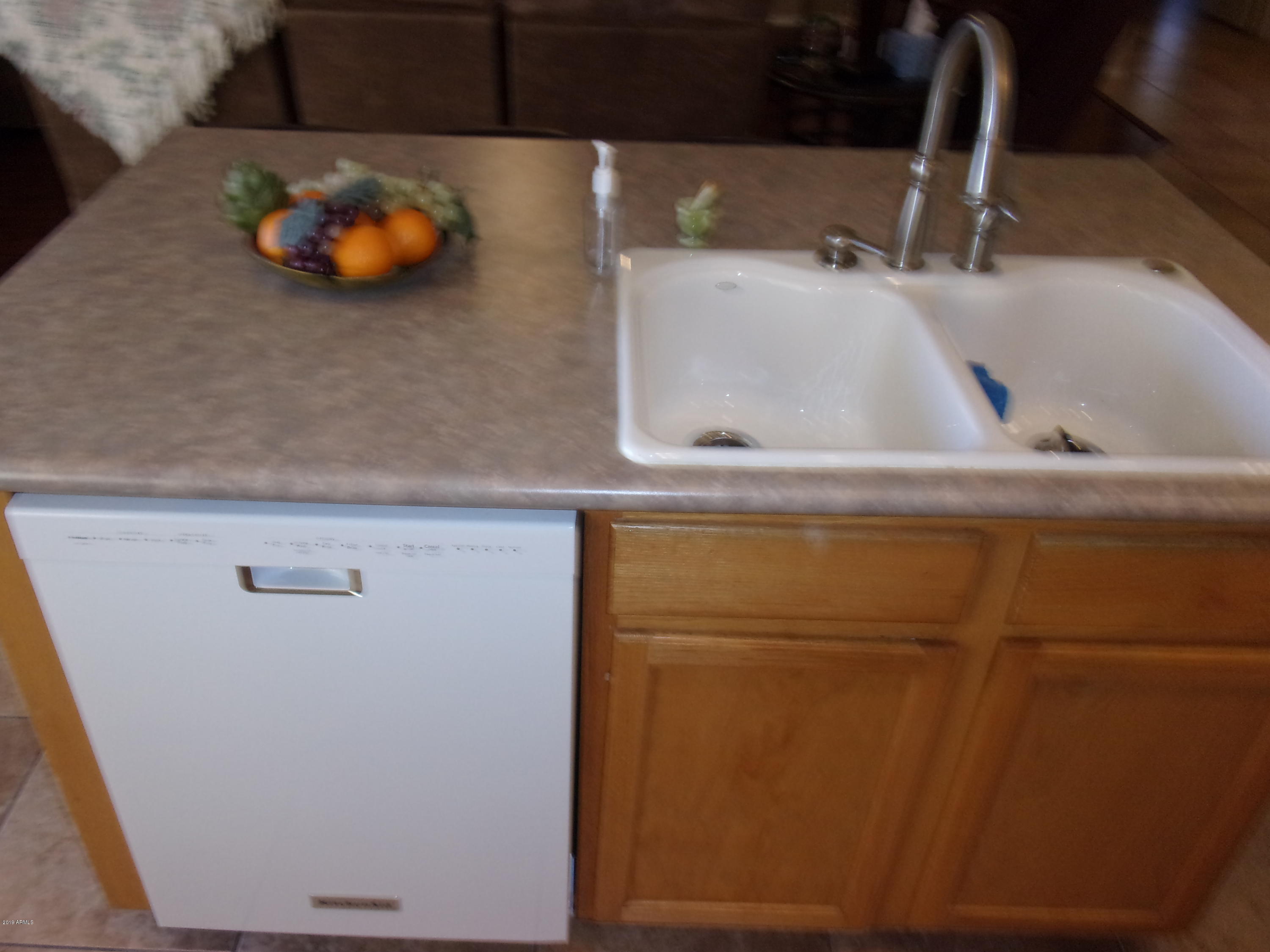 2742 East Harwell Road Gilbert, AZ 85234 - Photo 19 of 45 a bathroom with a sink and vanity