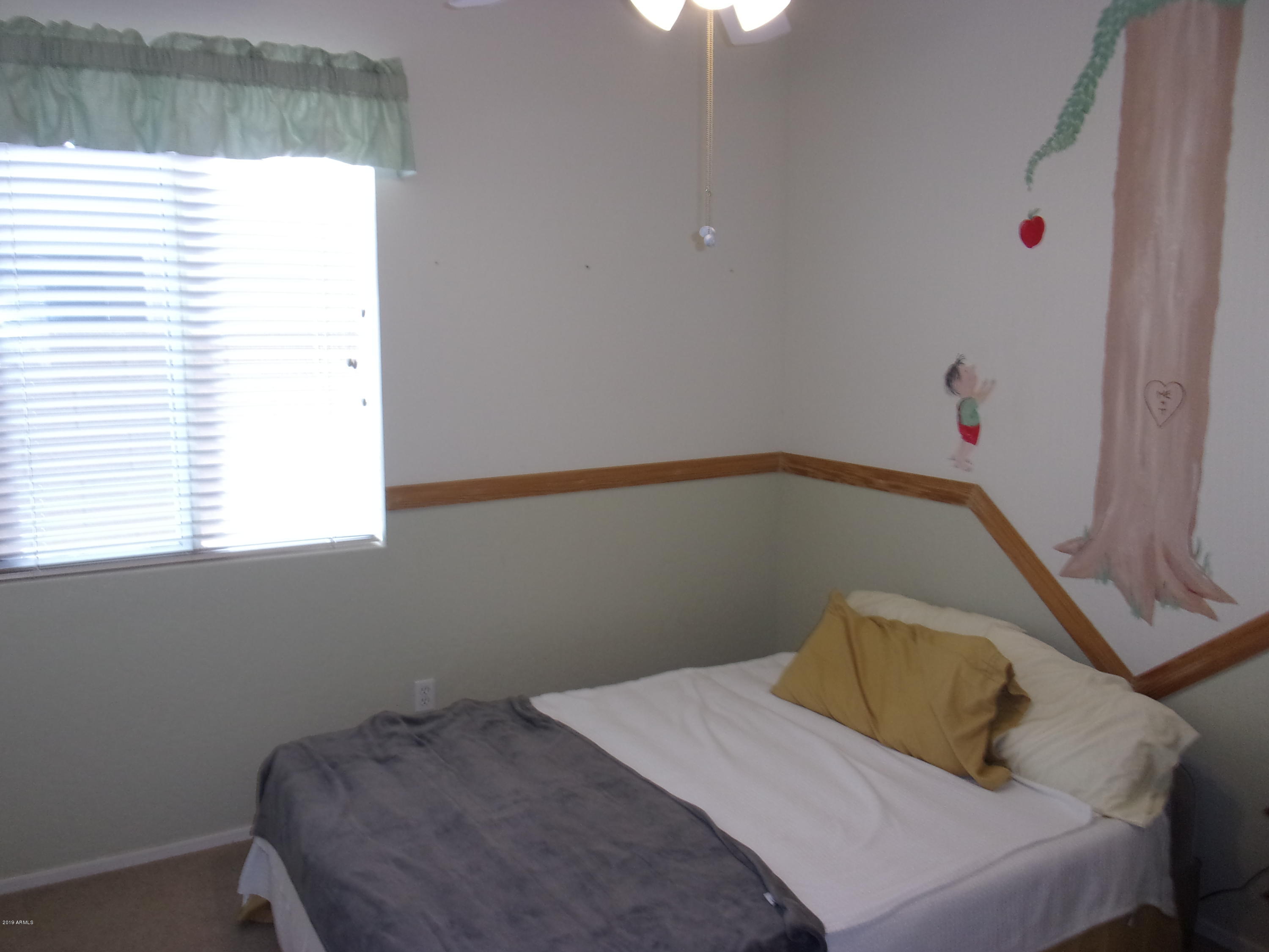 2742 East Harwell Road Gilbert, AZ 85234 - Photo 25 of 45 a bedroom with a bed and a window