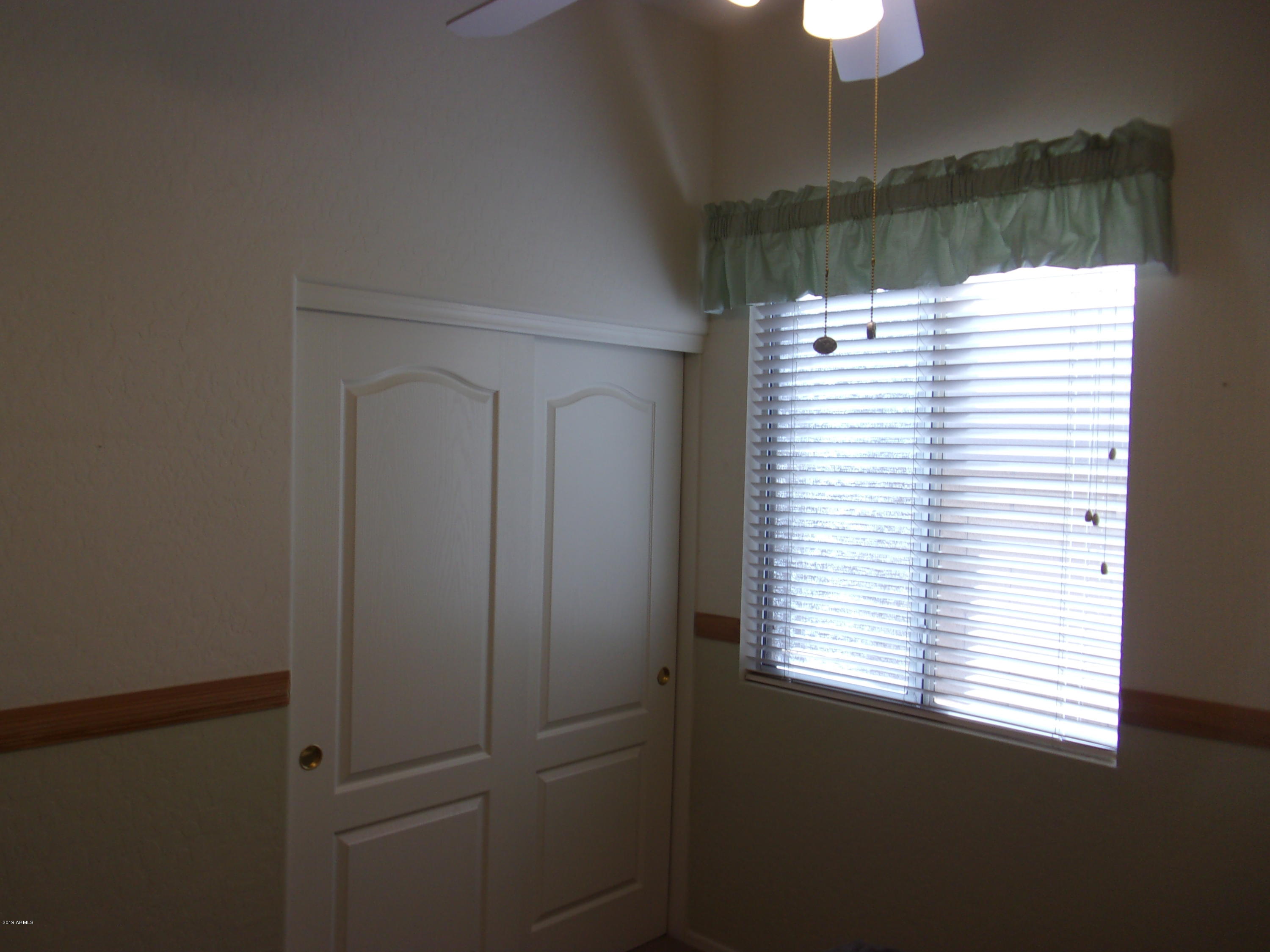2742 East Harwell Road Gilbert, AZ 85234 - Photo 26 of 45 a view of a bathroom with a window
