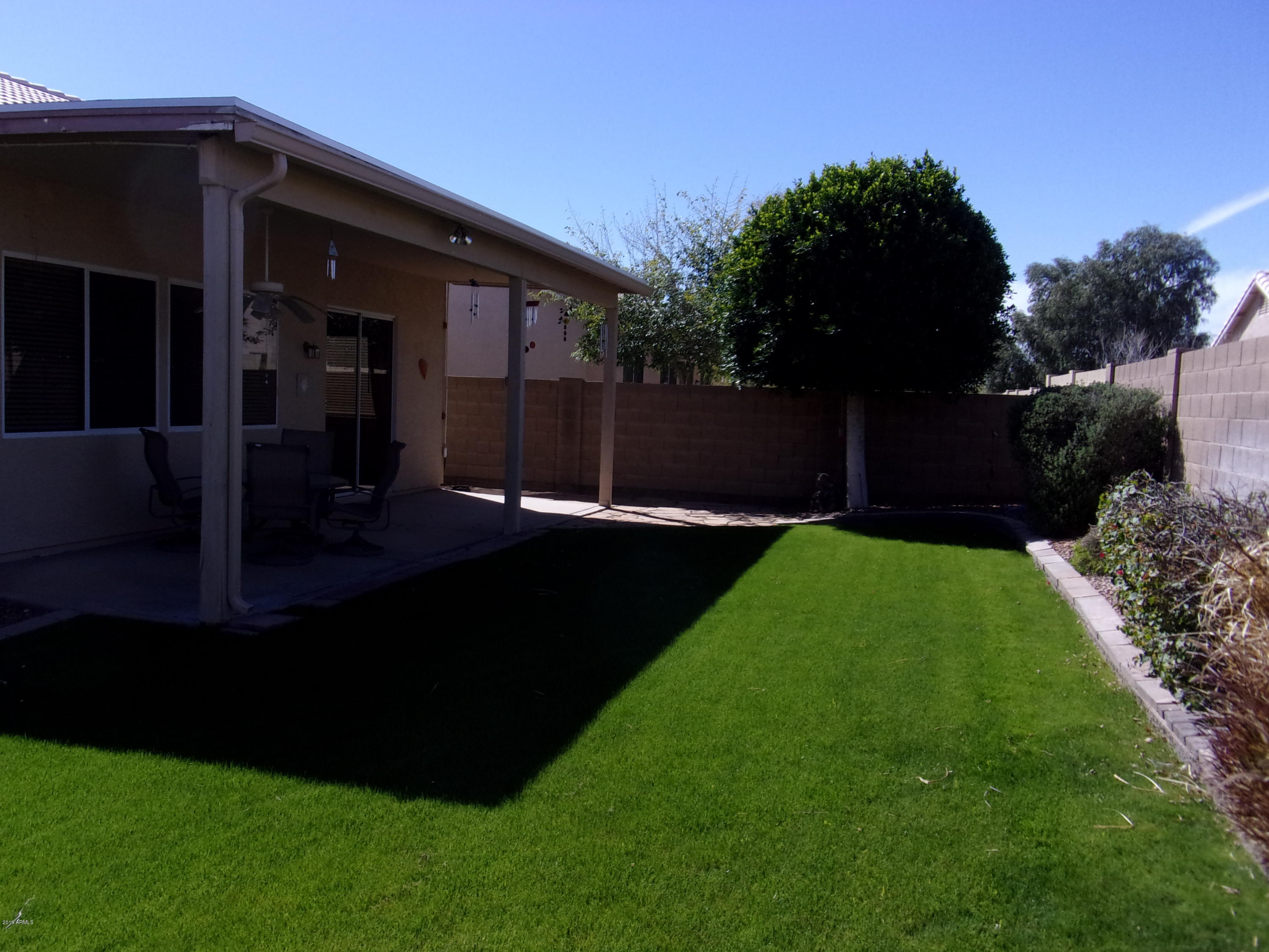 2742 East Harwell Road Gilbert, AZ 85234 - Photo 35 of 45 a view of a backyard of the house