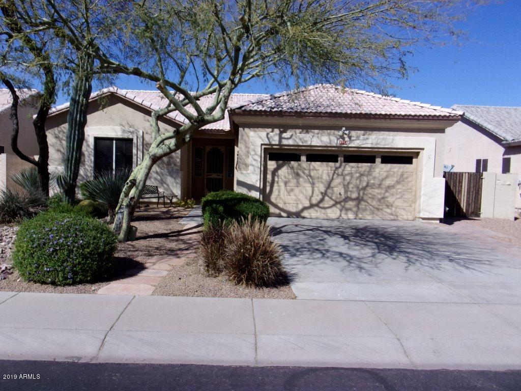 2742 East Harwell Road Gilbert, AZ 85234 - Photo 42 of 45 a front view of a house with garden
