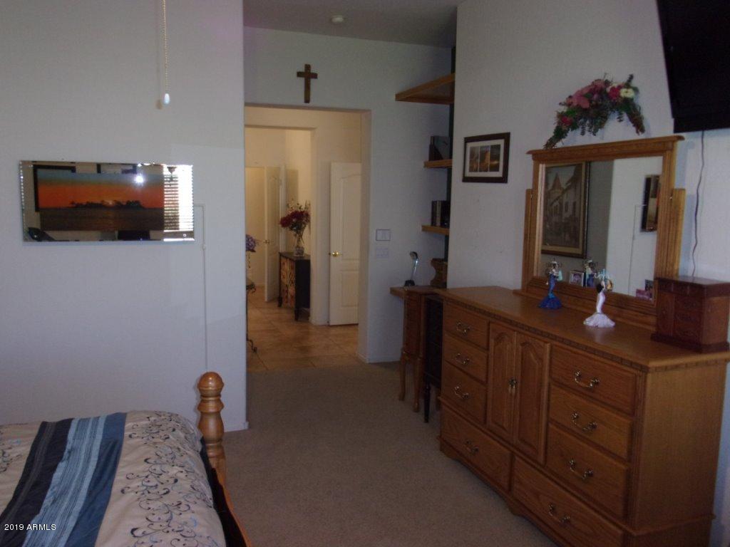 2742 East Harwell Road Gilbert, AZ 85234 - Photo 10 of 45 a bathroom with a sink a large mirror and a shower