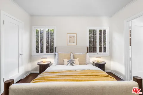 a workspace with furniture and a window