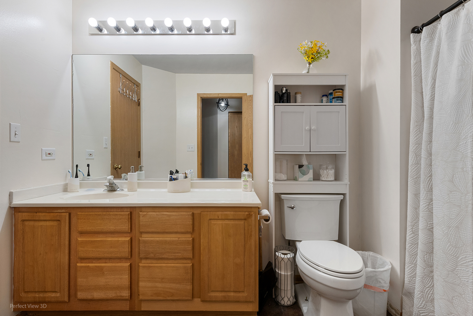 1310 Harvest Drive Crest Hill, IL 60403 - Photo 15 of 21 a bathroom with a sink a toilet and mirror