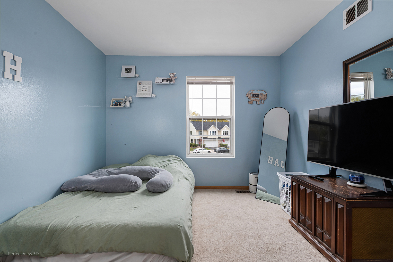 1310 Harvest Drive Crest Hill, IL 60403 - Photo 16 of 21 a bedroom with a bed and a flat screen tv